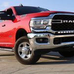 Red RAM truck front view showcasing RAM 2500 3500 HD 40in Light Bar curved LED PRO mounted in front bumper