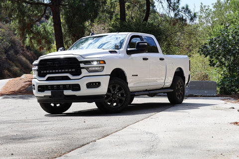 2025+ RAM 2500 Light kit lower grille LED pod lights installed on white RAM 2500 truck front view