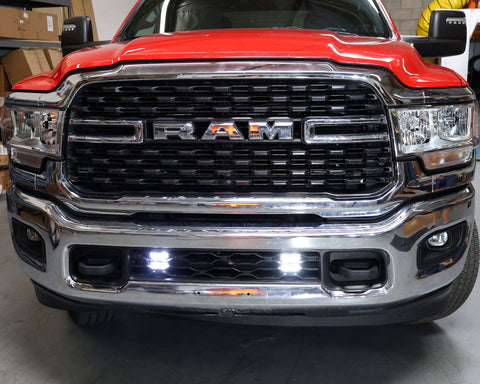 RAM 2500 lightbar Bumper Light kit installed with lower grille LED light pods on 2019-2024 RAM 2500 front bumper