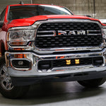 RAM 2500 lightbar Bumper Light kit installed on 2019-2024 RAM 2500 lower grille with LED light pods illuminated