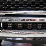 RAM 2500 lightbar Bumper Light kit installed in lower grille with 4 LED light pods on 2019-2024 RAM 2500 front bumper