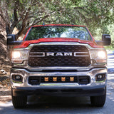 RAM 2500 lightbar Bumper Light kit installed with lower grille LED light pods on 2019-2024 RAM 2500 truck front view