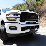 2025+ RAM 2500 light bar slim 40in curved LED installed on white RAM 2500 truck front bumper view