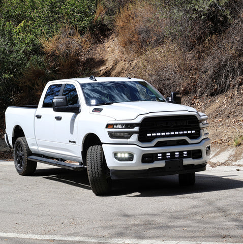 2025+ RAM 2500 & 3500 Ditch Lights PRO dual color white LED with amber DRL on white RAM truck parked on road