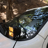 RAM 2500 Ditch Lights dual color amber DRL mounted on 2019-24 RAM 2500 windshield pillar for off-road visibility