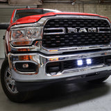 RAM 2500 lightbar Bumper Light kit installed with lower grille LED light pods on 2019-2024 RAM 2500 front chrome bumper