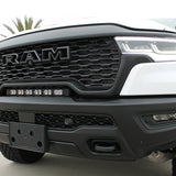 RAM RHO light bar PRO 23in curved LED installed between grille and bumper on 2025 RAM 1500 RHO front view