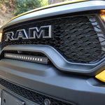 RAM TRX Light bar slim 23in mounted between grille and bumper on 2021-2024 RAM 1500 TRX front view