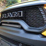 RAM TRX Light bar slim 23in mounted between grille and bumper on 2021-2024 RAM 1500 TRX front view