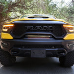 RAM TRX Light bar slim 23in curved LED in factory grille opening on 2021-2024 RAM 1500 TRX front view