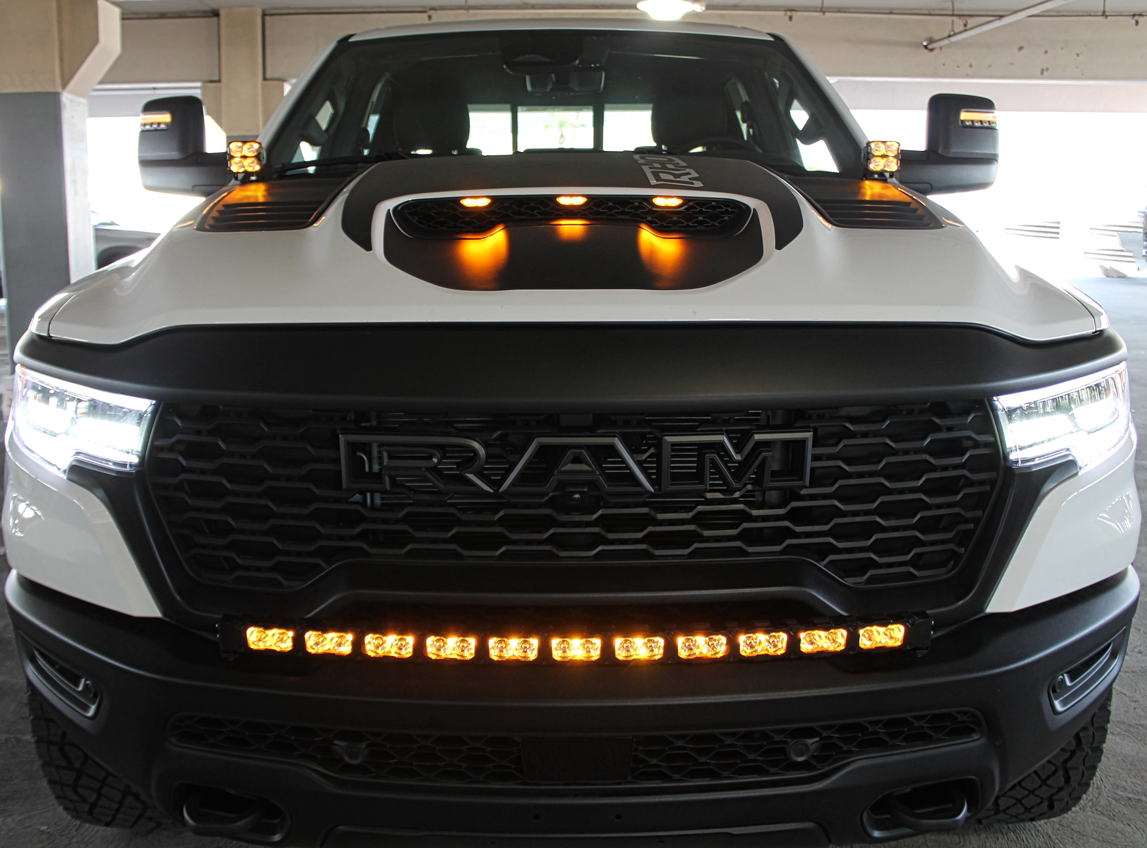 RAM RHO Ditch Lights - PRO 2025+ installed on RAM 1500 with dual color white LED and amber DRL backglow