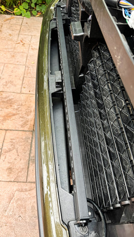 grille removed on 2024 ford ranger raptor with top view of 30in LED light bar behind the grille