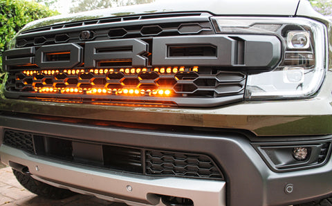 2024 ranger raptor dual LED light bars behind the grille