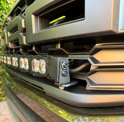 in front grille of 2024 ford ranger raptor with LED light bar