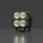 Black off-road light on a dark gray background