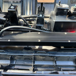 behind grille 2024 toyota tacoma showing light bar