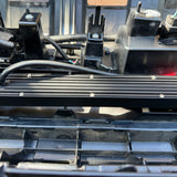 behind grille 2024 toyota tacoma showing light bar