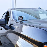 Silverado 1500 ditch lights mounted on driver side hood of black 2022 Chevrolet Silverado truck