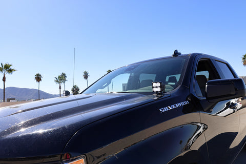 Silverado 1500 ditch lights PRO dual color ditch light pods mounted on 2022+ Chevrolet Silverado 1500 black truck