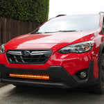 red 2022 subaru crosstrek gen 2 with light bar in lower grille for off roading