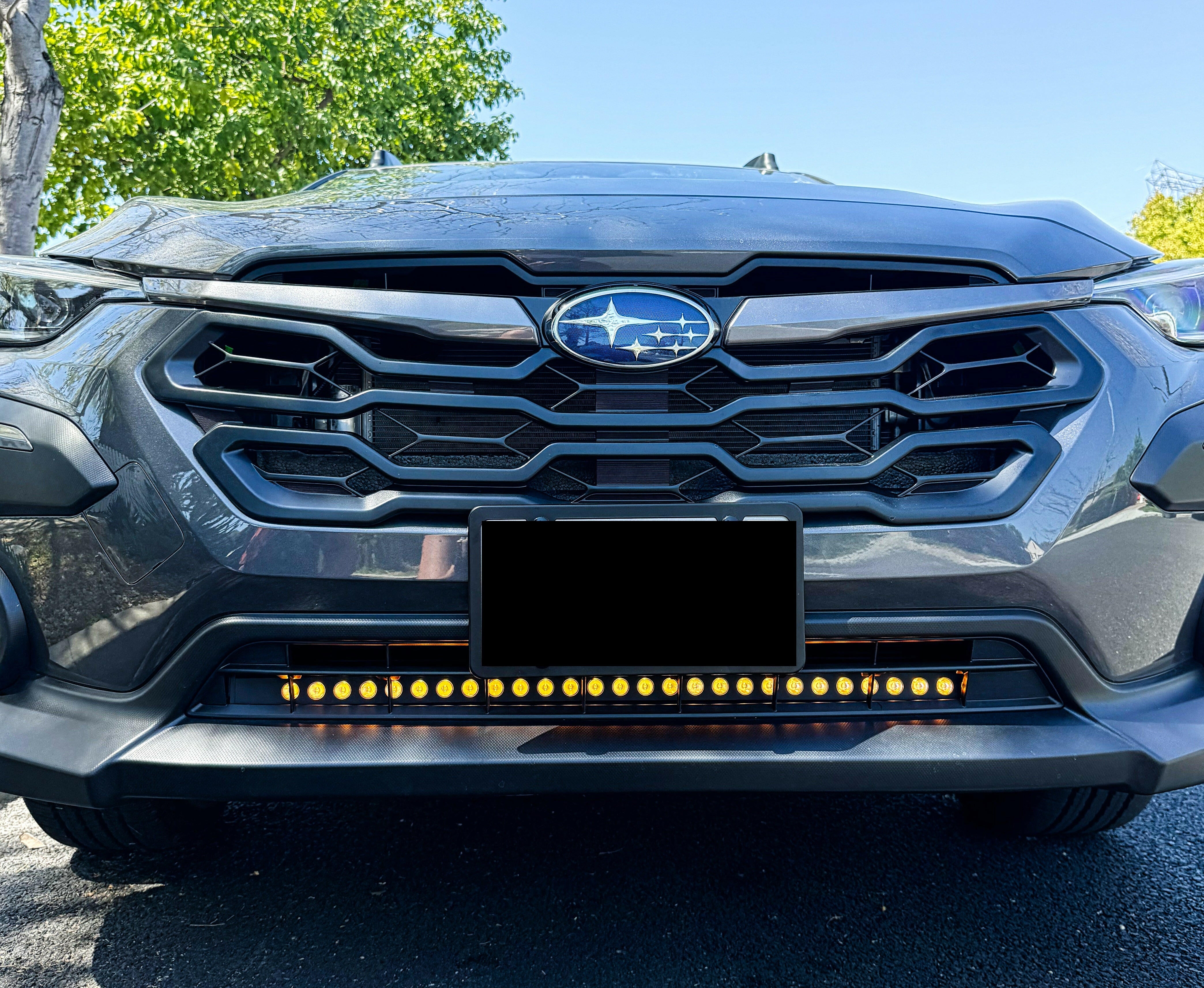 grey subaru crosstrek with amber daytime running lights led light bar off roading