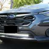 grey subaru crosstrek with white  led light bar off roading
