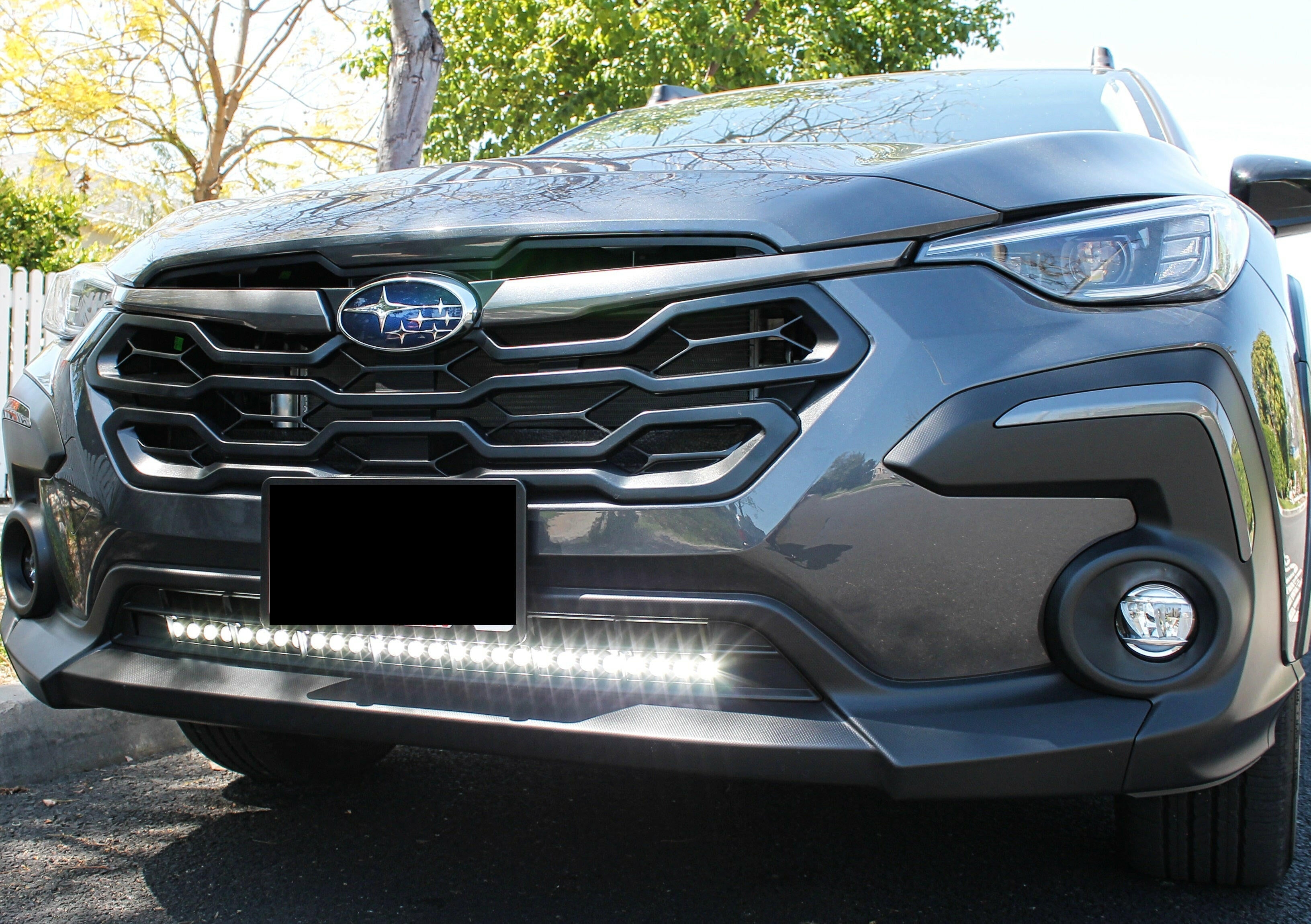 grey subaru crosstrek with white  led light bar off roading