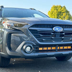 grey subaru outback with amber daytime running lights led light bar off roading