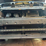 subaru outback behind grille with led light bar off roading