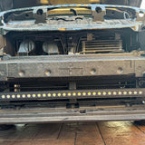 subaru outback behind grille with led light bar off roading