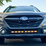 grey subaru outback with amber daytime running lights led light bar off roading