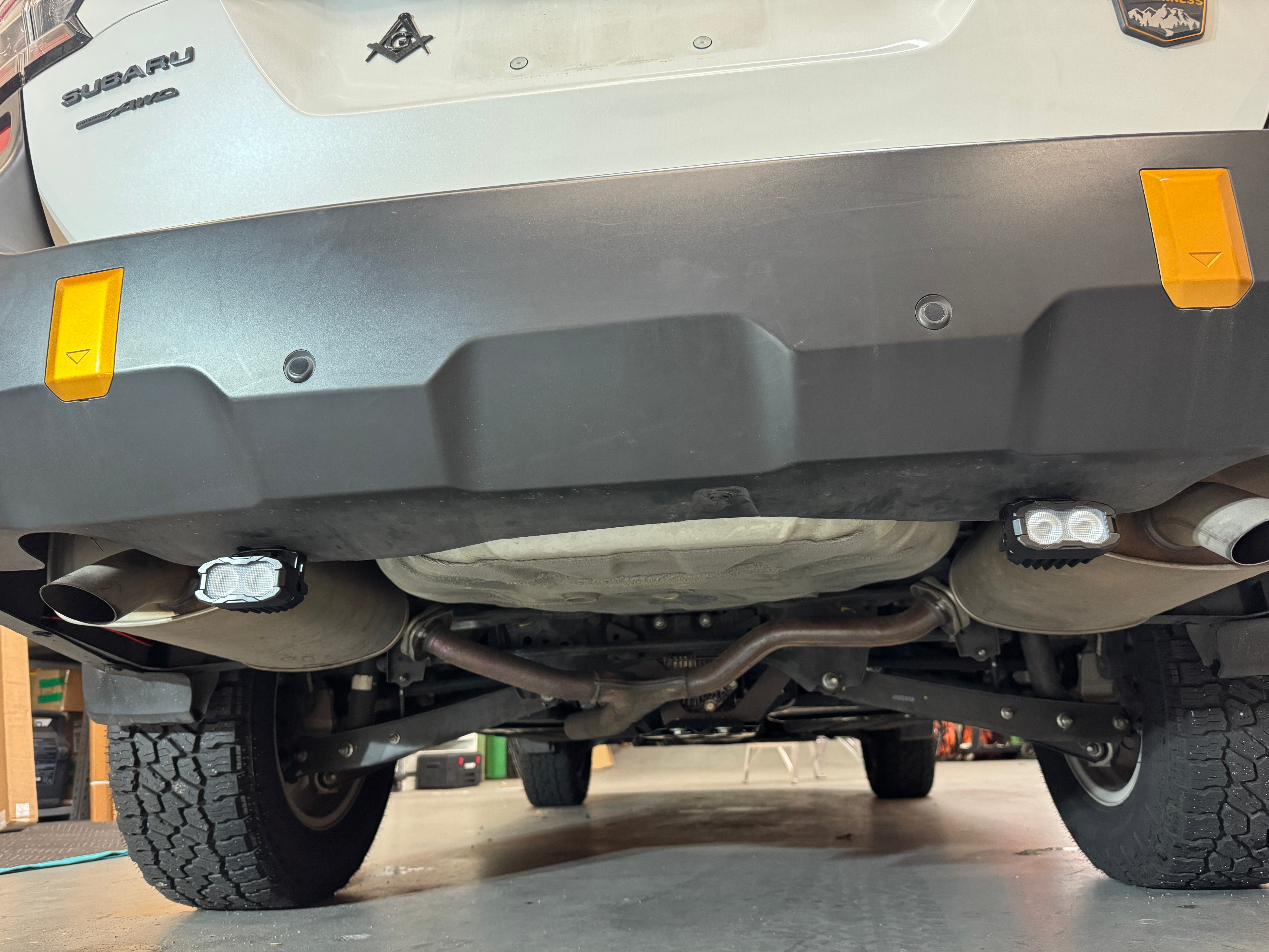 Subaru Outback reverse light kit installed under rear bumper, dual LED pods on 2020-2024 Subaru Outback