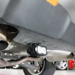 Subaru Outback reverse light kit installed under rear bumper, dual white LED pods for 2020-2024 Outback models