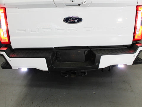 white 2023 2024 ford superduty with white reverse LED light kit on 