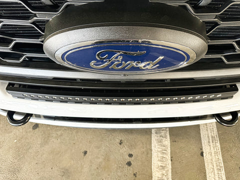 up close curved LED light bar on top bumper ford superduty