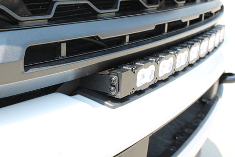 white curved LED light bar installed on top of bumper of ford superduty 2023