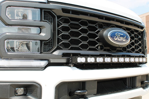 up close view white 2023 2024 ford superduty with 40in curved LED light bar on top of bumper 