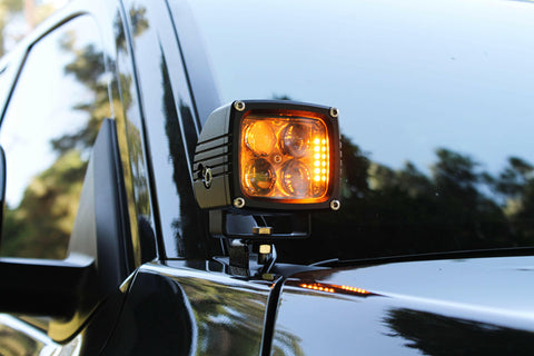 upclose ditch light on new black 2024 toyota tacoma amber light light pillars