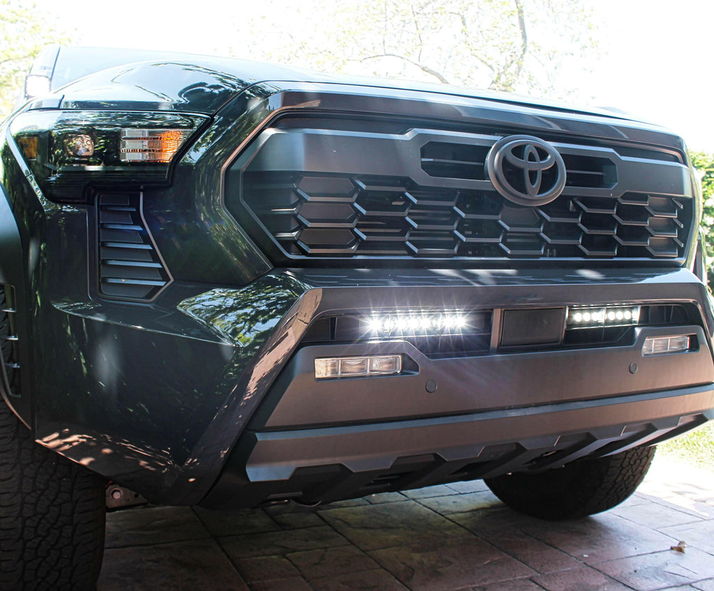 gray 2024 toyota tacoma led light bar behind grille white color