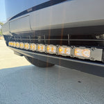 up close view black tesla cybertruck with amber LED light bar m&r automotive 