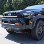 4Runner Light Bar slim curved 40in LED mounted in front grille on 2025 Toyota 4Runner TRD Off-Road style black SUV