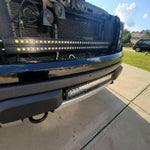 2010-2014 Ford Raptor Gen 1 Light Bars installed behind grille and bumper, dual LED 40s front lighting upgrade