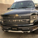 Ford Raptor Gen 1 fog light kit installed on 2010-2014 Ford Raptor front bumper with dual function amber and white fog lights