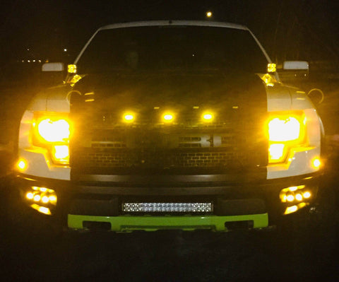 ford raptor generation 1 2010 2011 2012 2013 2014 with off roading fog light kit in the dark 