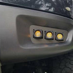 2010-2014 Ford Raptor Gen 1 Dual Function Fog Light Kit installed in bumper, triple Ford Raptor Gen 1 fog light pods