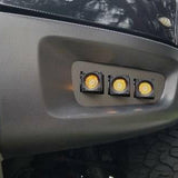 2010-2014 Ford Raptor Gen 1 Dual Function Fog Light Kit installed in bumper, triple Ford Raptor Gen 1 fog light pods