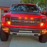 2010-2014 Ford Raptor Gen 1 with amber DRL dual function Ford Raptor Gen 1 fog light kit installed in factory front bumper