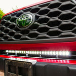 2016 2017 2018 2019 upclose red Toyota Tacoma with one white 30in Light Bar