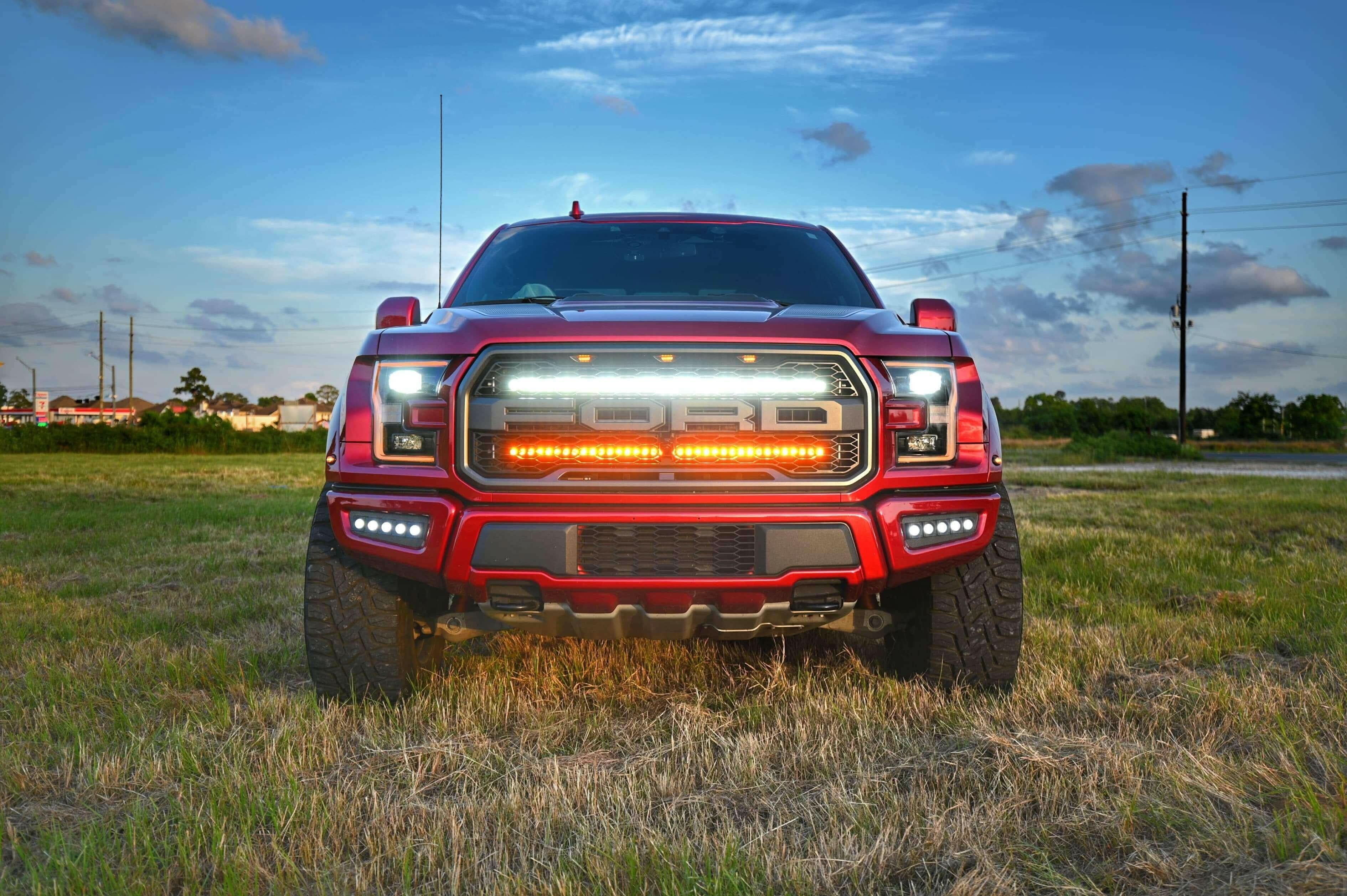 2017-2020 red Ford Raptor Gen 2 Light Bars dual 40s LED grille mounted off-road lighting upgrade front view