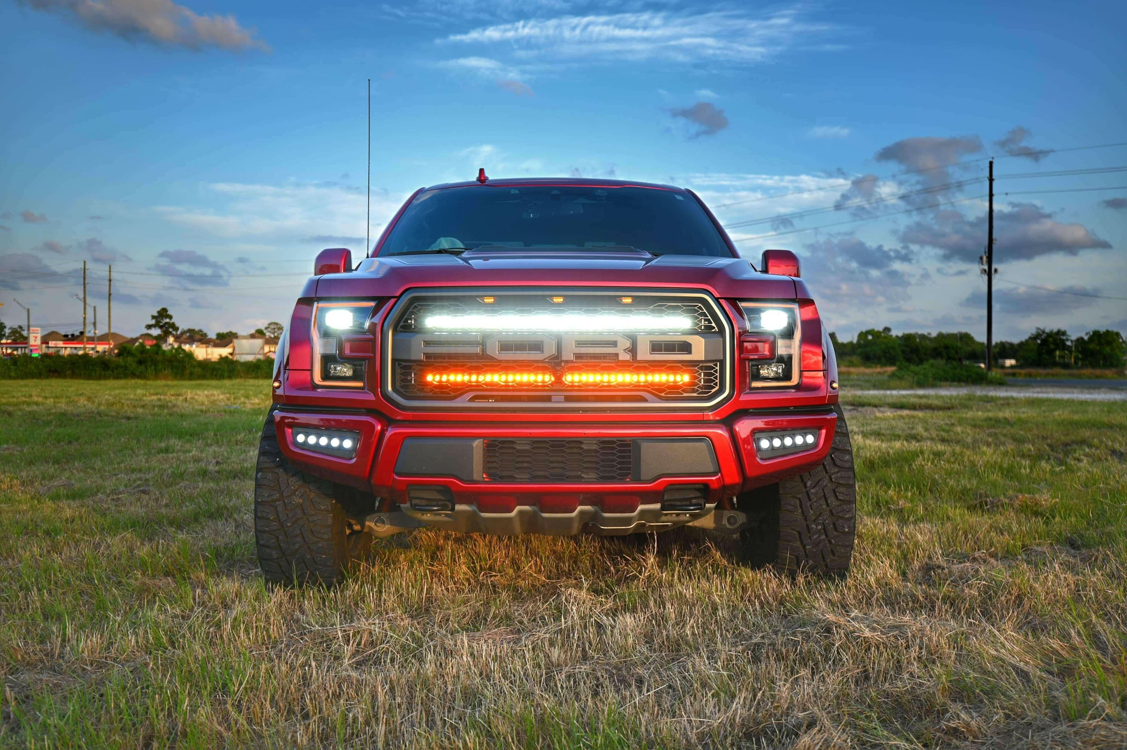 2017-2020 red Ford Raptor Gen 2 Light Bars dual 40s LED grille mounted off-road lighting upgrade front view